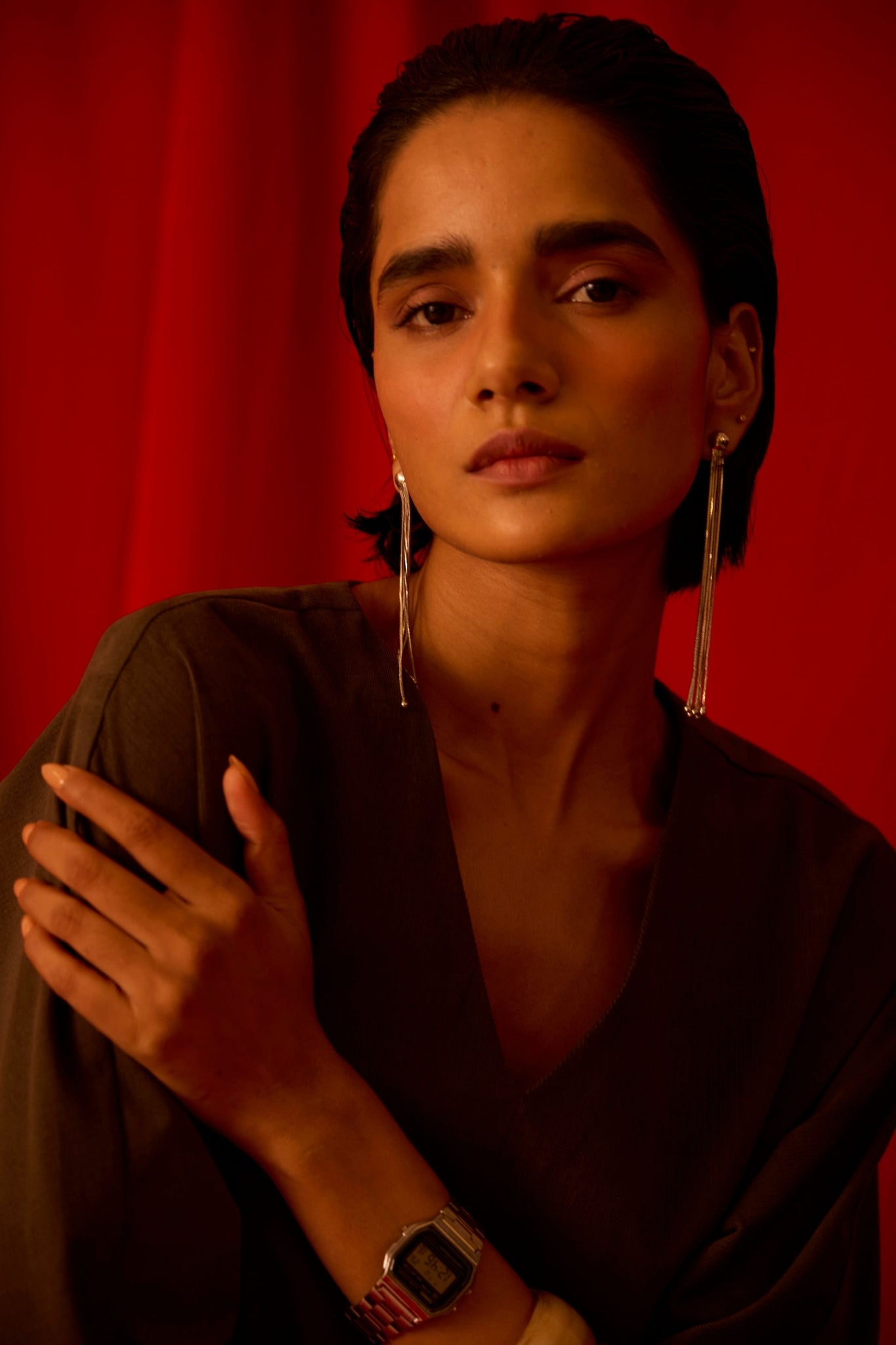 Olive needlecord shift dress with V-neckline, kimono-inspired sleeves, and in-seam pockets.