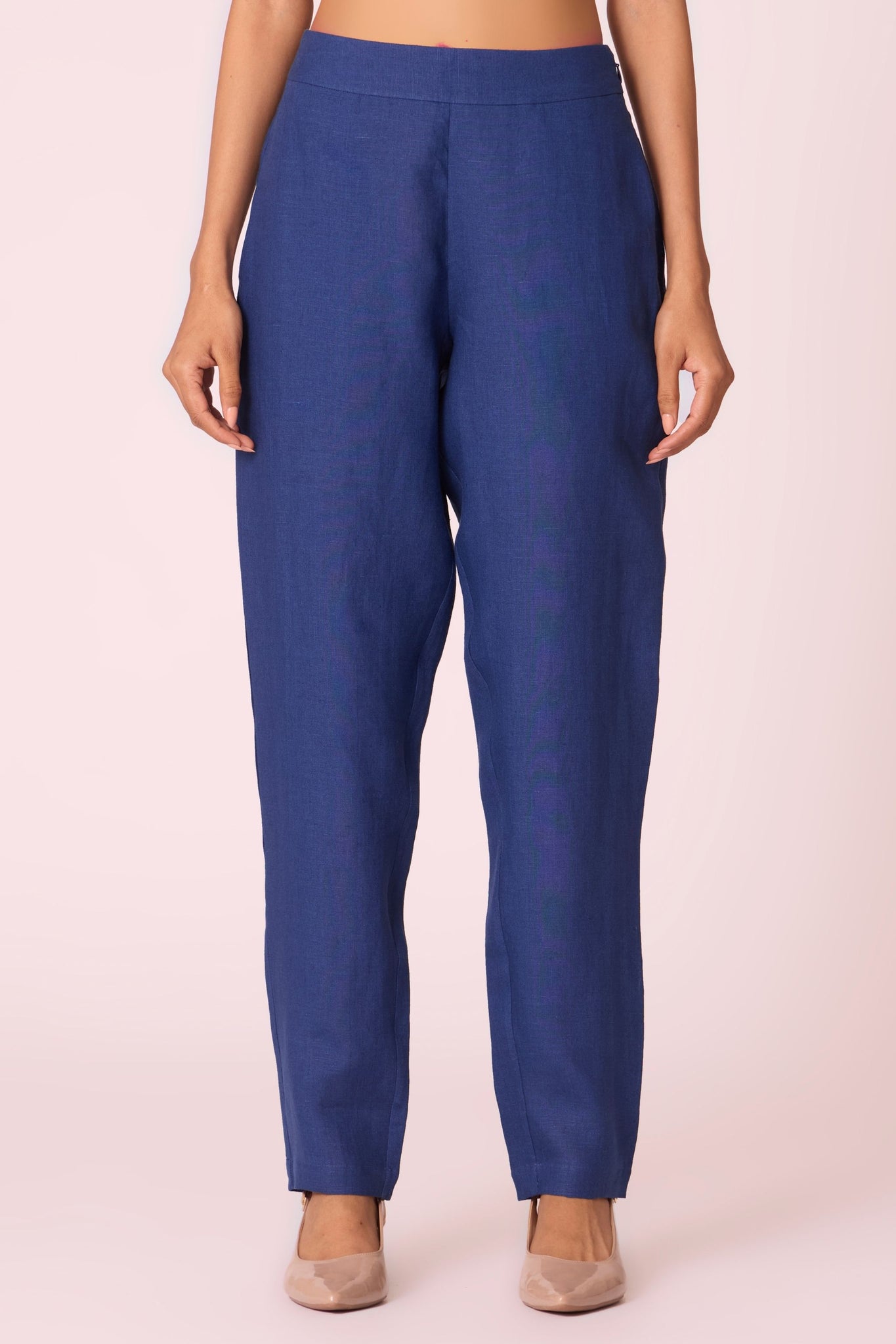 Ink blue linen tunic set with hand-embroidered 3/4 sleeves, back button tunic, and slim-fit side-zip pants.