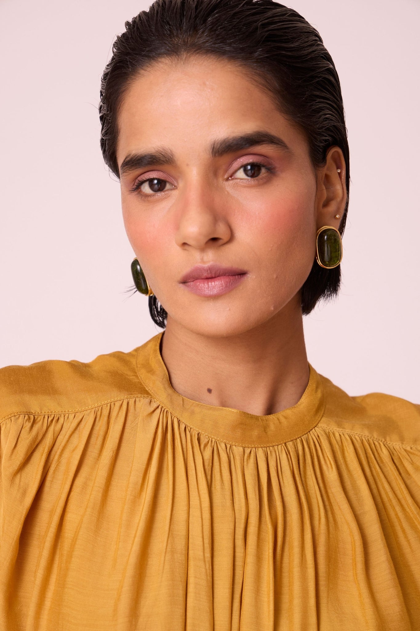 Yellow cupro midi dress with adjustable hand-embroidered belt, back button fastening, and slip included.
