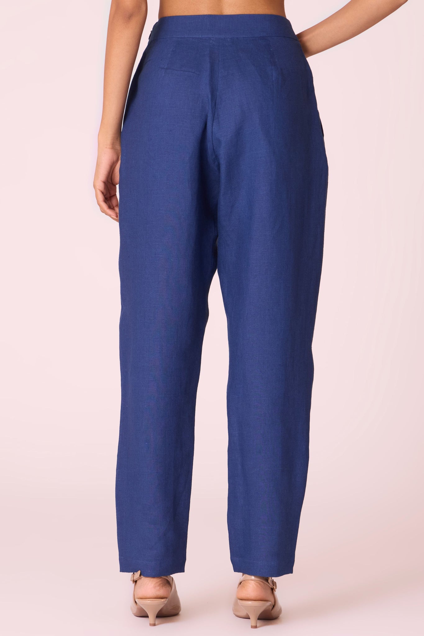 Ink blue linen tunic set with hand-embroidered 3/4 sleeves, back button tunic, and slim-fit side-zip pants.