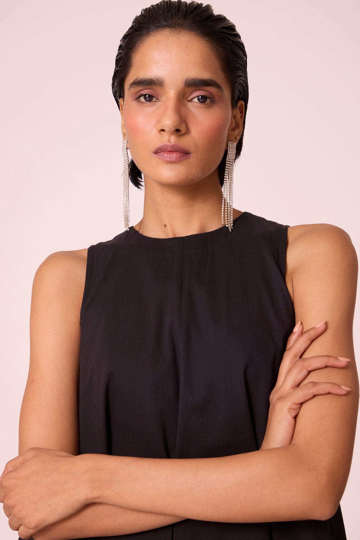 Black layered maxi dress in organic cotton cambric with in-cut shoulders and rouleau back fastening.
